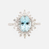 Anillo Charlotte Oro Blanco 14K con Aquamarina Oval y Diamantes.