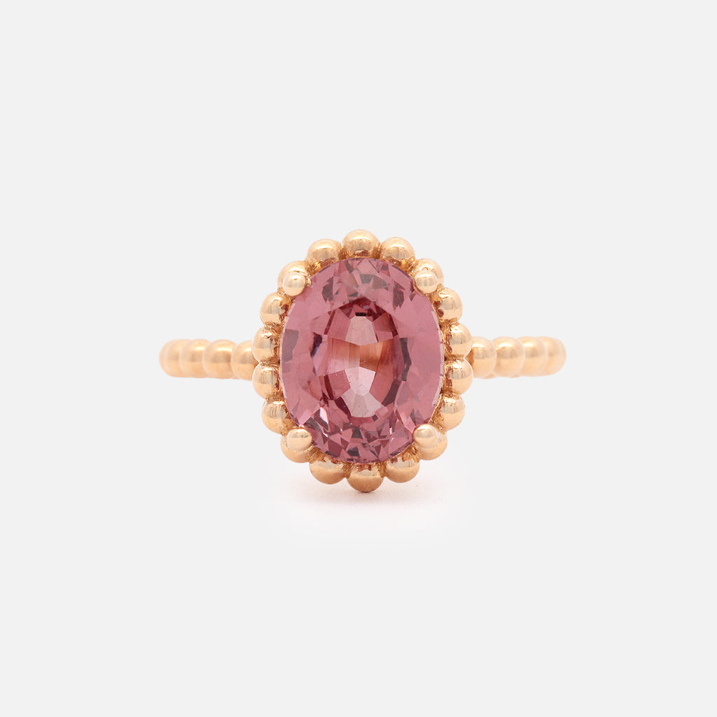Anillo Elysa Oro Amarillo 14K con Granate Malaya Oval.