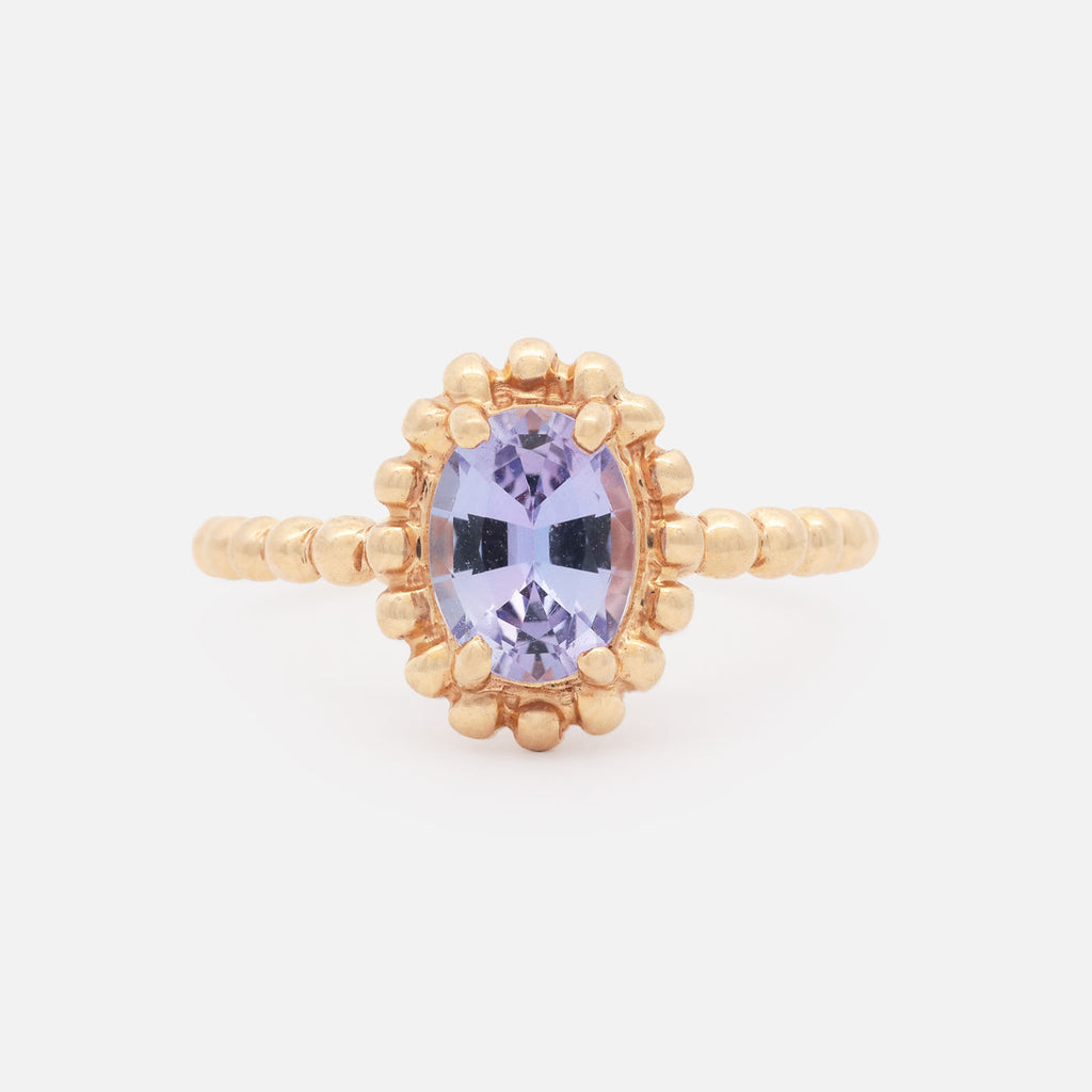 Anillo Elysa Oro Amarillo 14K con Tanzanita Oval.