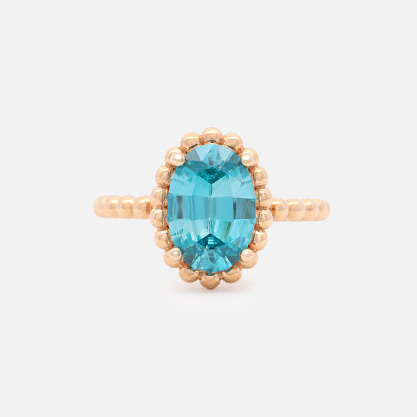 Anillo Elysa Oro Amarillo 14K con Zircón Celeste Oval.