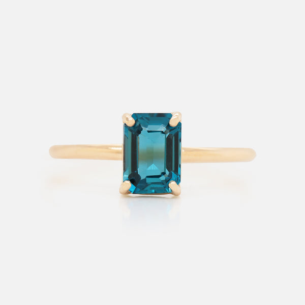 Anillo Valeria Oro Amarillo 14K con Topacio London Blue Octagón.