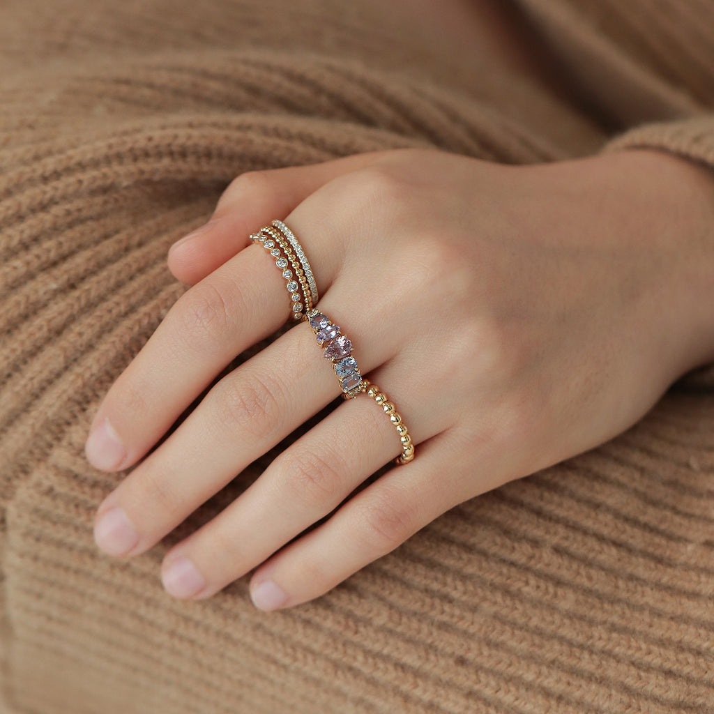 Anillo Atom Princess Oro Amarillo 14K con Granate Malaya, Zafiro y Diamante.