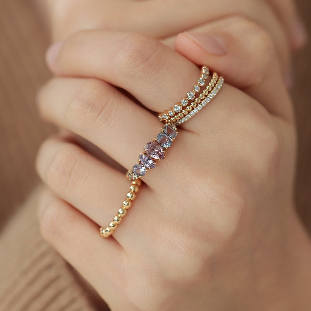 Anillo Atom Princess Oro Amarillo 14K con Granate Malaya, Zafiro y Diamante.