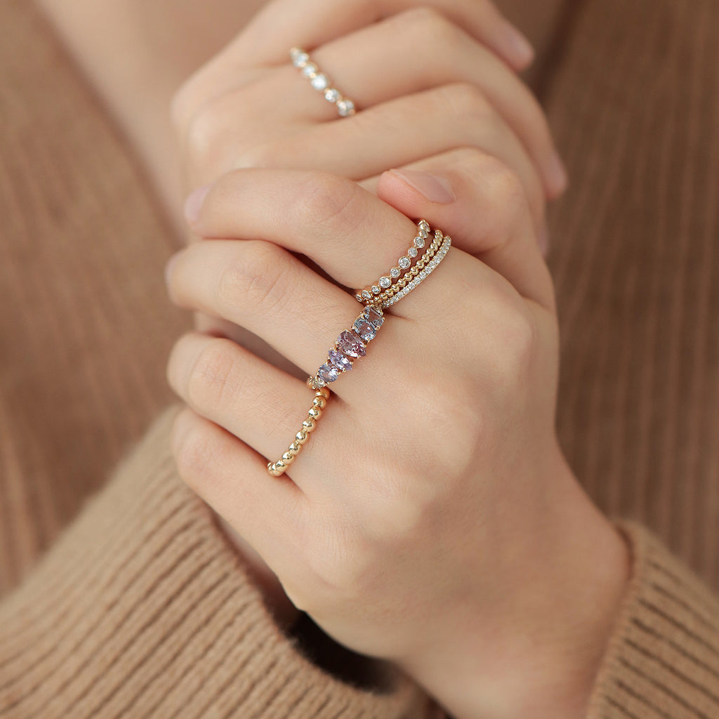 Anillo Atom Princess Oro Amarillo 14K con Granate Malaya, Zafiro y Diamante.