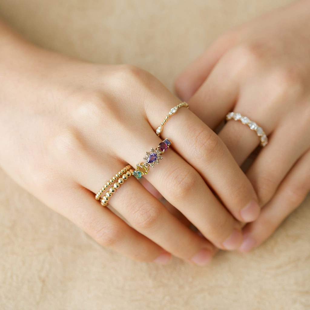 Anillo Botanical Poppy Joy Oro Amarillo 14K con Zafiro, Rodolitas, Diamantes y Turmalinas.