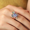 Anillo Botanical Violeta Oro Amarillo 14K con Tanzanita, Turmalina, Zafiro, Granate y Topacio London Blue.