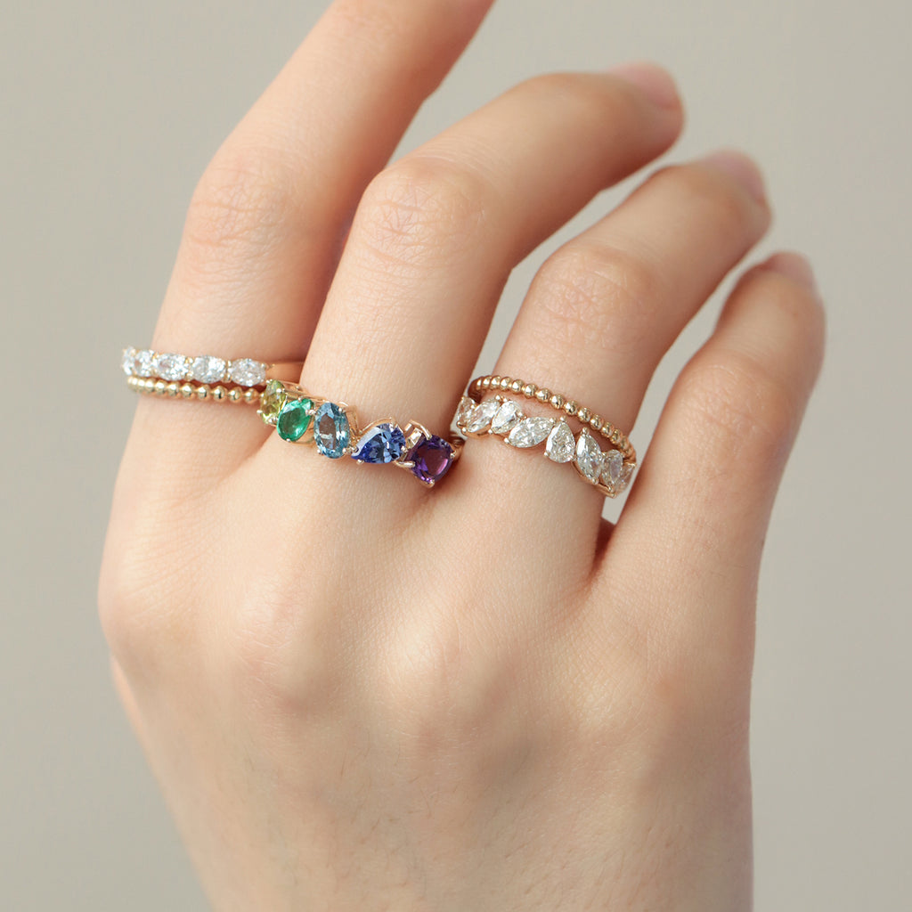 Anillo Centauro Daisy Oro Amarillo 14K con Peridoto, Esmeralda, Aquamarina, Tanzanita y Amatista.