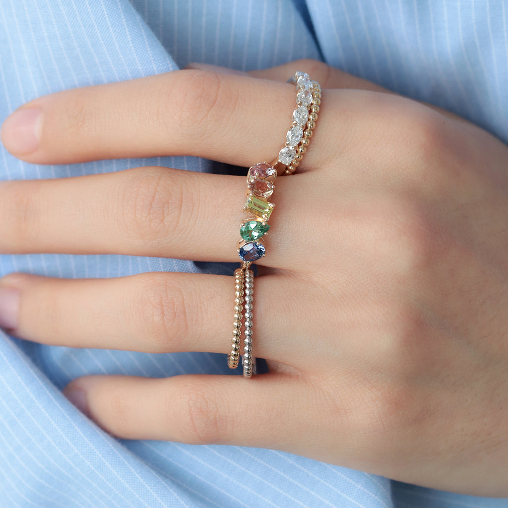 Anillo Centauro Rainbow Oro Amarillo 14K con Zafiros y Turmalina.