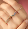Anillo Cluster Aurora Oro Amarillo 14K con Zafiro y Diamantes.