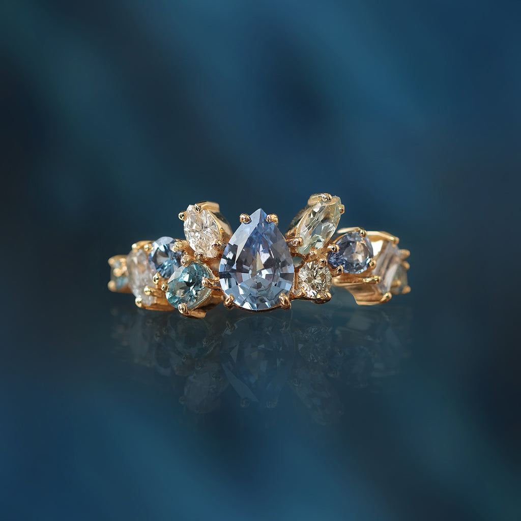 Anillo Eclipse Baby Blue Oro 14K con Zafiros, Aquamarinas y Diamantes.