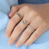 Anillo Elysa Oro Amarillo 14K con Tanzanita Oval.