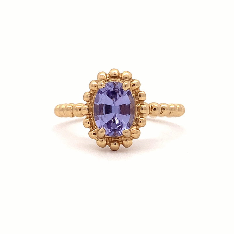 Anillo Elysa Oro Amarillo 14K con Tanzanita Oval.