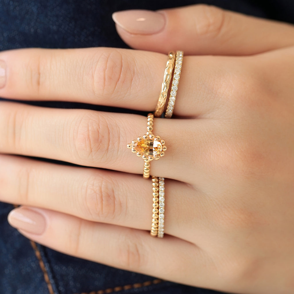Anillo Elysa Oro Amarillo 14K con Topacio Imperial Gota.