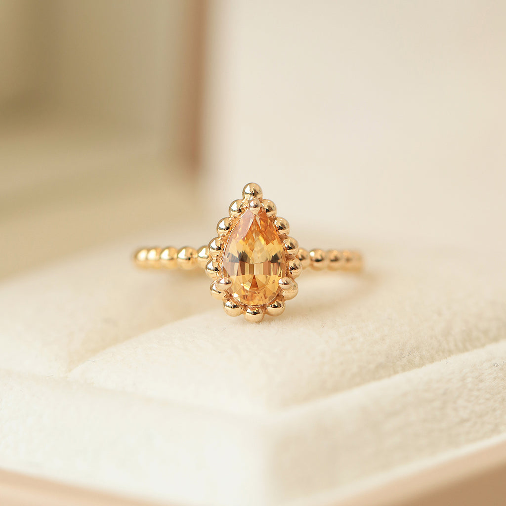 Anillo Elysa Oro Amarillo 14K con Topacio Imperial Gota.