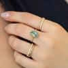 Anillo Elysa Oro Amarillo 14K con Zircón Celeste Oval.