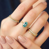 Anillo Elysa Oro Amarillo 14K con Zircón Celeste Oval.