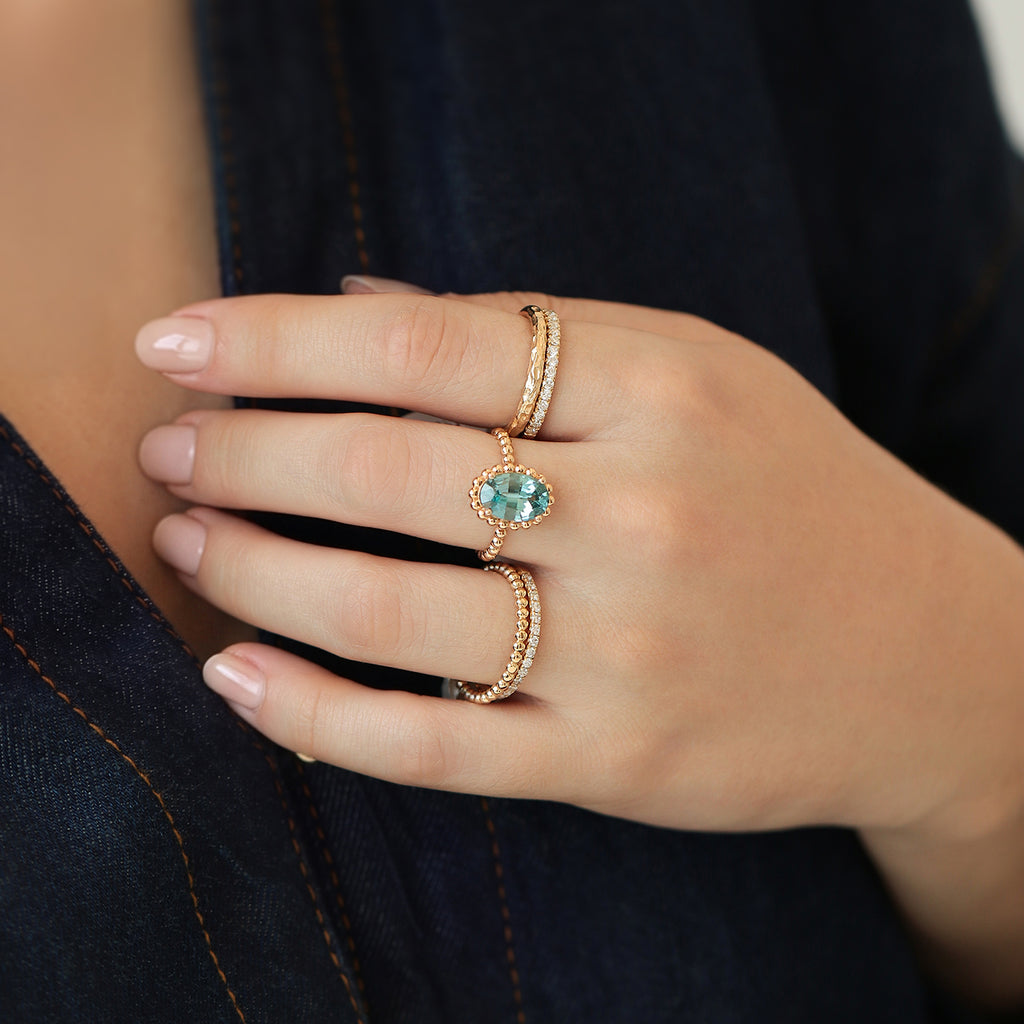 Anillo Elysa Oro Amarillo 14K con Zircón Celeste Oval.