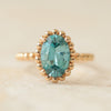 Anillo Elysa Oro Amarillo 14K con Zircón Celeste Oval.
