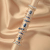 Anillo Charlotte Oro Amarillo 14K con Zafiro Gota y Diamantes.
