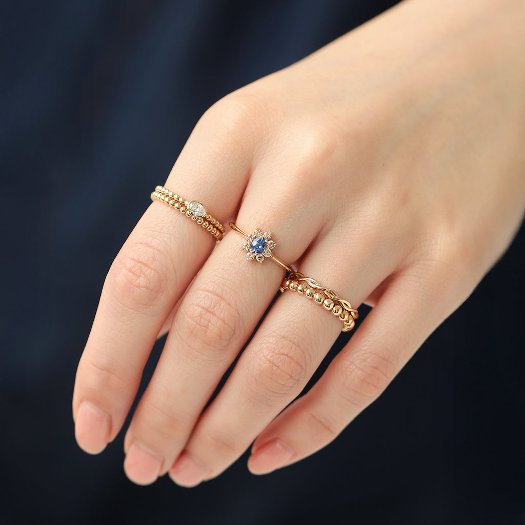 Anillo Imperial Oro Amarillo 14K con Zafiro y Diamantes Champagne.