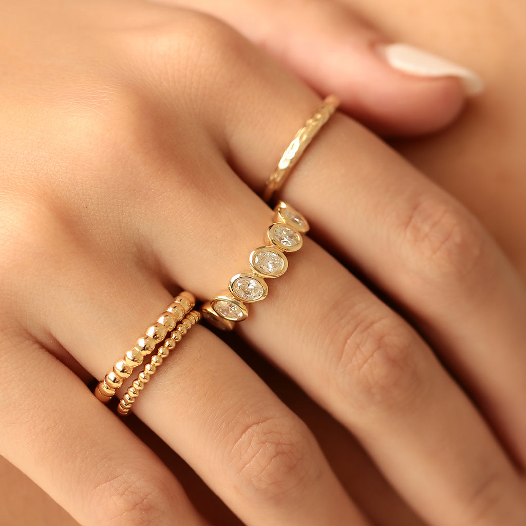 Anillo Lens Oro Amarillo 18K con Diamantes.