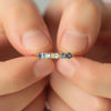 Anillo Myla Royal Blue Oro Amarillo 14K con Diamante, Zafiros y Aquamarinas.