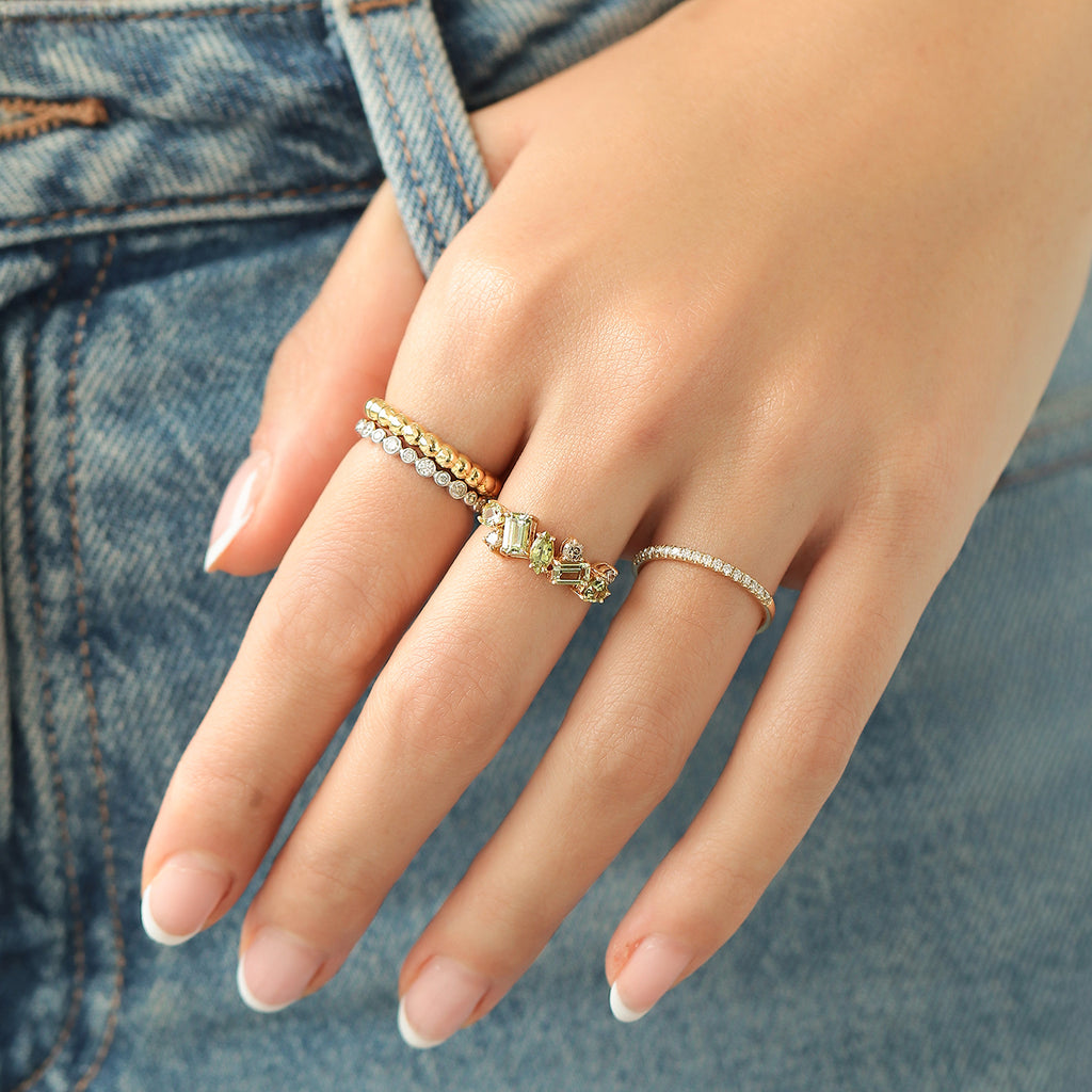 Anillo Stellar Kiwi Oro Amarillo 14K con Zafiros y Diamantes.