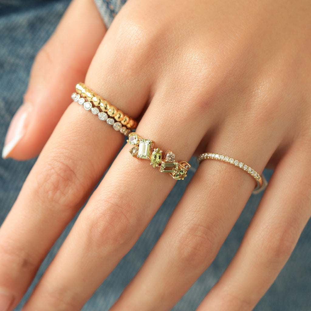 Anillo Stellar Kiwi Oro Amarillo 14K con Zafiros y Diamantes.