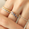 Anillo Stellar Lavanda Oro Amarillo 14K con Zafiro y Diamante.
