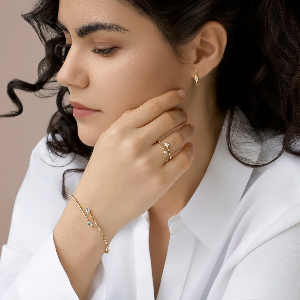 Anillo Astra Oro Amarillo 14K con Diamantes.