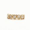 Anillo Lens Oro Amarillo 18K con Diamantes.