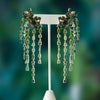 Aretes Botanical Juniper Oro Amarillo 14K con Turmalinas, Zafiros y Tanzanitas Unheated.