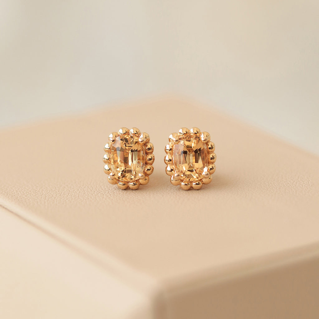 Aretes Elysa Oro Amarillo 14K con Topacios Imperial.