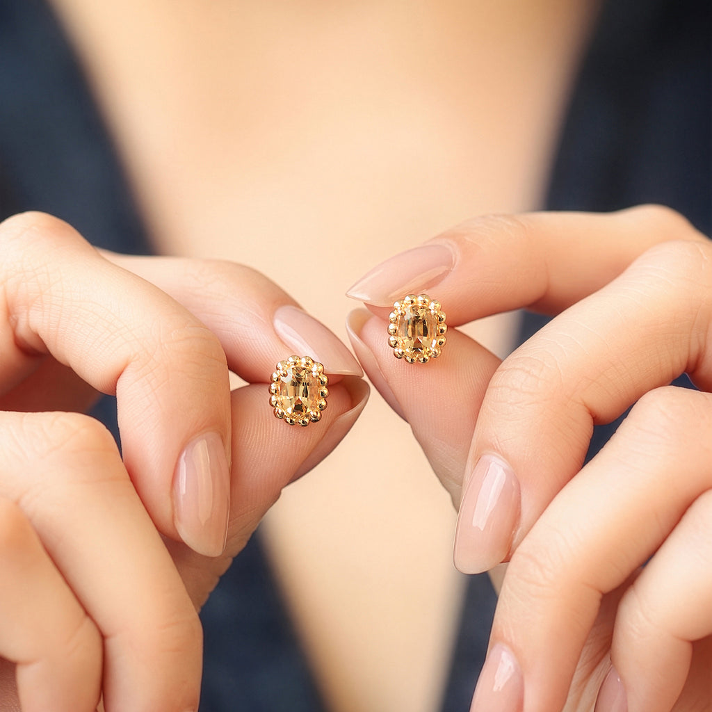 Aretes Elysa Oro Amarillo 14K con Topacios Imperial.