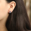 Aretes Gardenia Oro Blanco 18K con Tanzanitas y Diamantes.