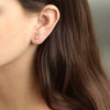 Aretes Nest Oro 18K con Diamantes.