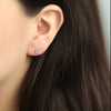 Aretes Orbit Oro Amarillo 18K con Diamantes.