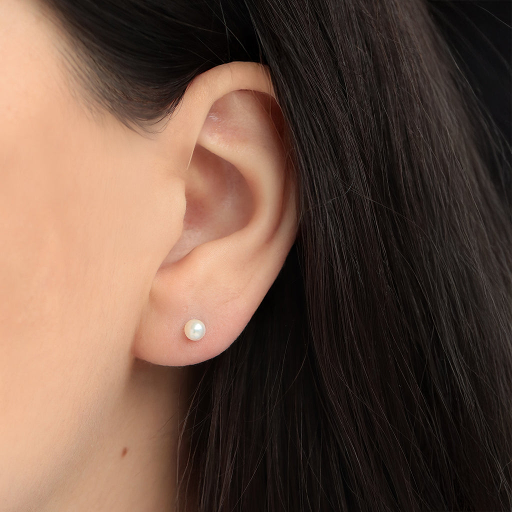 Aretes Orbit Oro Amarillo 18K con Perlas.