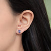 Aretes Orbit Oro Amarillo 14K con Tanzanitas Oval.