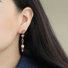 Aretes Saturn Oro Amarillo 14K con Turmalinas, Diamantes y Perlas.