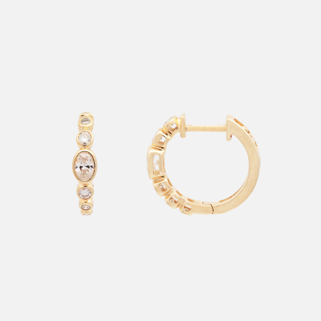 Arracadas Apolo Oro 14K con Diamante Central Oval.