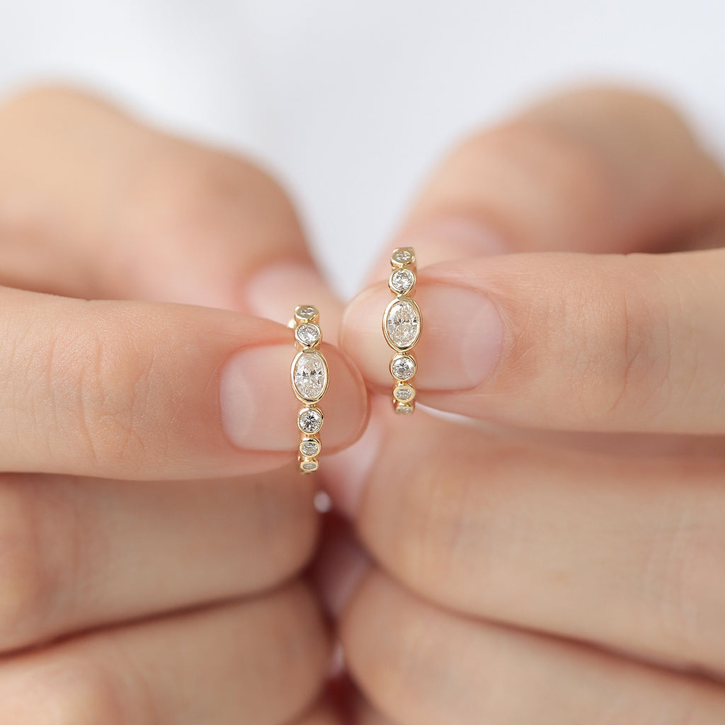 Arracadas Apolo Oro 14K con Diamante Central Oval.