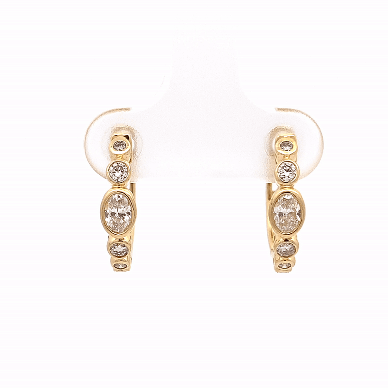 Arracadas Apolo Oro 14K con Diamante Central Oval.