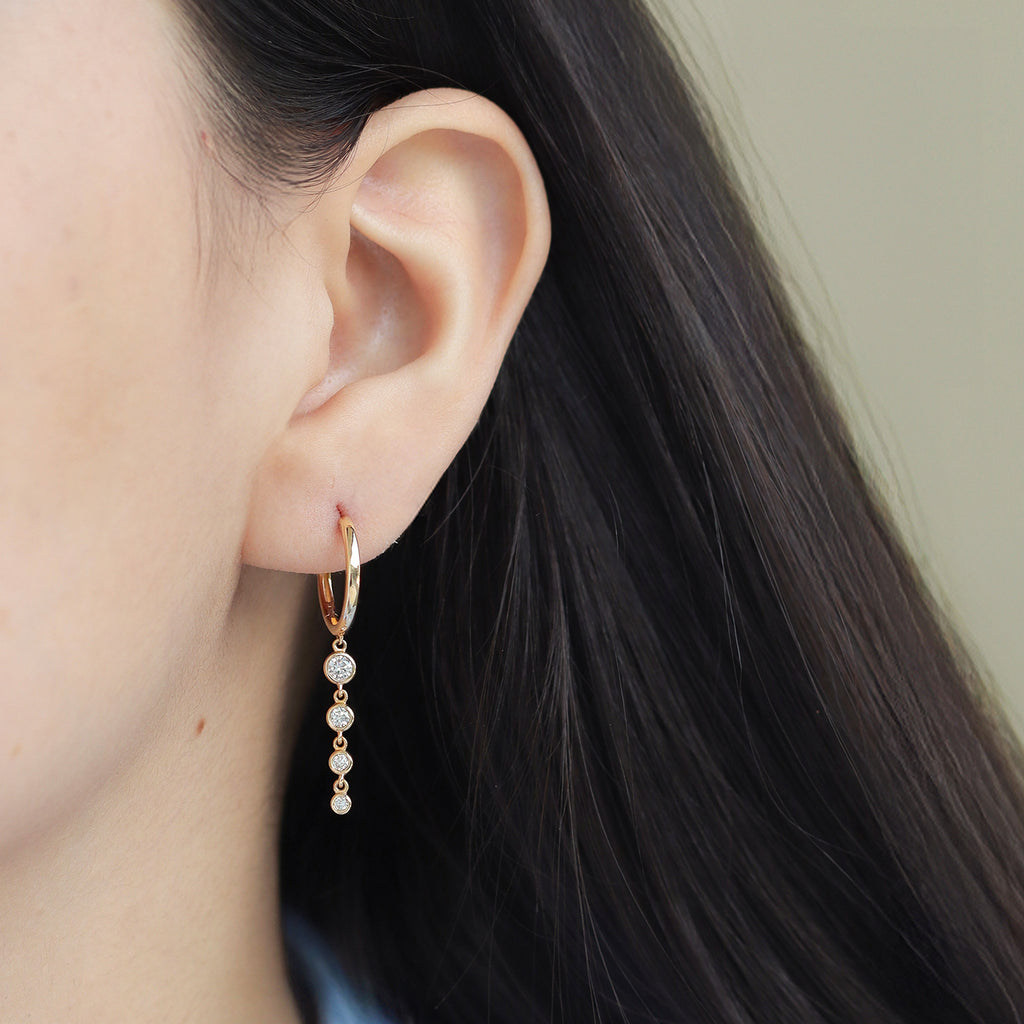 Arracadas Centauro Oro 14K con Diamantes.