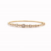Brazalete Orion Oval Oro Amarillo 14K con Diamantes.