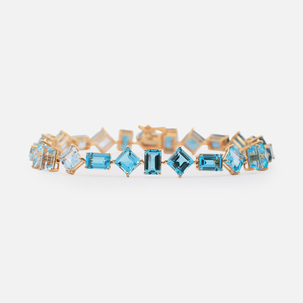 Brazalete Gradient Blue Oro Amarillo 18K con Topacios.