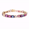 Brazalete Berry Oro Amarillo 14K con Granates, Zafiros, Amatistas, Tanzanitas y Moonstones.