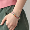Brazalete Fénix Oro Amarillo 14K con Zafiros, Turmalinas, Tanzanitas, Granates, Amatistas, Topacios, Rubí, Peridotos y Citrinos.