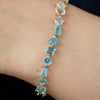 Brazalete Gradient Blue Oro Amarillo 18K con Topacios.