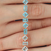 Brazalete Gradient Blue Oro Amarillo 18K con Topacios.